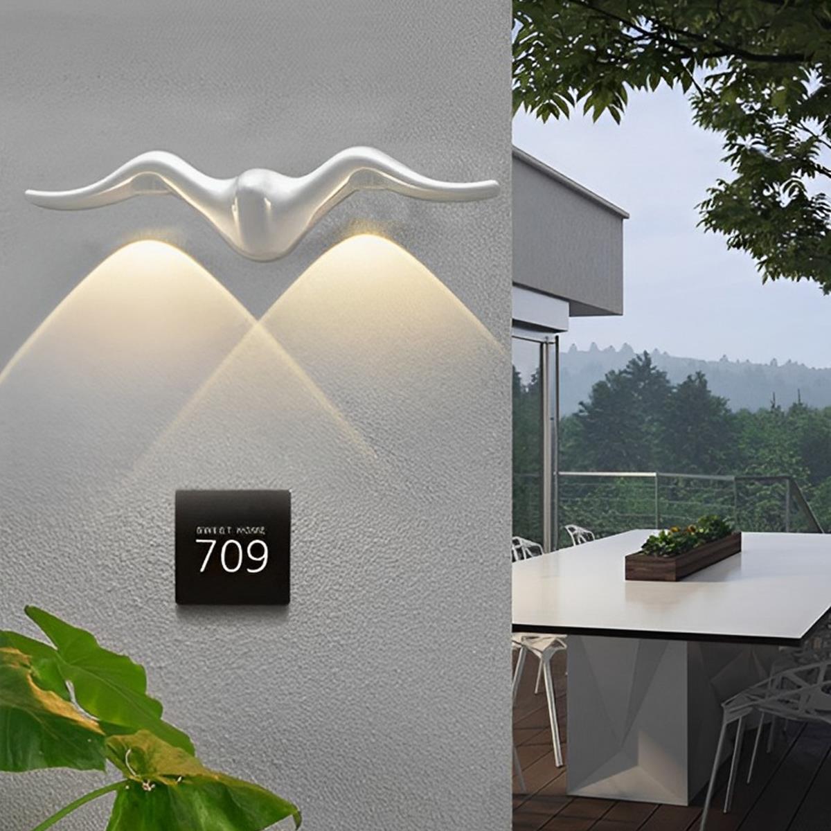 Atlas Silhouette Outdoor Wall Sconce